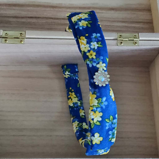 diadema cintillo en tela y broche en piedra